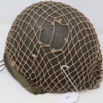 Original US WWII M1 Airborne helmet 1944 specification. rear seam, swivel bails, helmet is heat