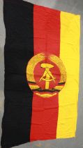 An East German printed cotton parade flag. UK P&P Group 1 (£16+VAT for the first lot and £2+VAT
