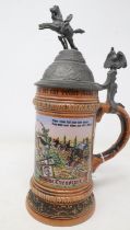 A German salt glazed stein by Gerz, with pewter hinged cover and pictorial decoration (loss of