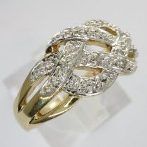 9ct gold crossover ring set with diamonds, size N/O, 2.8g. UK P&P Group 0 (£6+VAT for the first