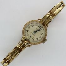 9ct gold ladies wristwatch on a 9ct gold expanding bracelet, not working at lotting. UK P&P Group