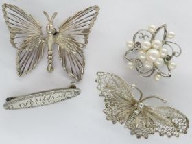 Three 925 silver brooches and a hallmarked silver example (4), largest L: 50 mm. UK P&P Group 1 (£