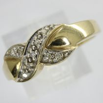 9ct gold crossover ring set with diamonds, size N, 2.3g. UK P&P Group 0 (£6+VAT for the first lot