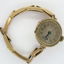 9ct gold cased ladies wristwatch on a 1/10th 9ct rolled gold expanding bracelet, glass loose but