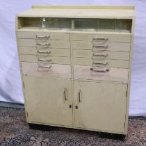 Two cream painted dentist cabinets one with back panel damage, each 90 x 36 x 104 cm. Not