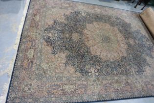 A substantial blue ground floor rug with complex designs, 350 x 250 cm. Not available for in-house