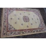 A modern thick pile cream ground floor rug, 240 x 170 cm. Not available for in-house P&P