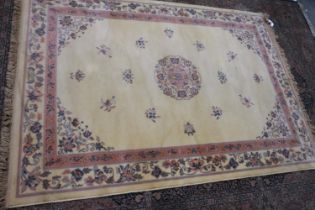 A modern thick pile cream ground floor rug, 240 x 170 cm. Not available for in-house P&P
