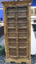 South American tall cupboard with steel embellishment to doors, 45 x 85 x 180 cm. Not available