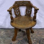 Heavily carved fully rotating oak ships chair. Not available for in-house P&P