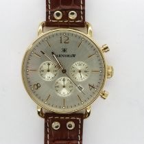 EARNSHAW: gents gold plated wristwatch with three subsidiary dials and date aperture on a brown
