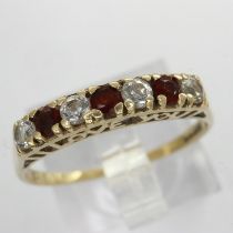9ct gold ring set with garnets and cubic zirconia, size P, 1.4g. UK P&P Group 0 (£6+VAT for the