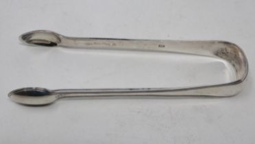 Pair of Georgian hallmarked silver sugar tongues, 50g. UK P&P Group 1 (£16+VAT for the first lot and