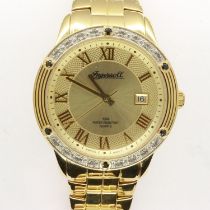 INGERSOLL: gents quartz wristwatch with date aperture on a gold plated stainless steel bracelet,