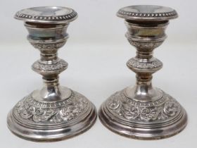 Pair of Broadway & Co hallmarked silver candlesticks, Birmingham assay, H: 12 cm. UK P&P Group 3 (£