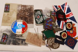 WWI and later military photographs (Imperial German), cap badges and division patches. UK P&P