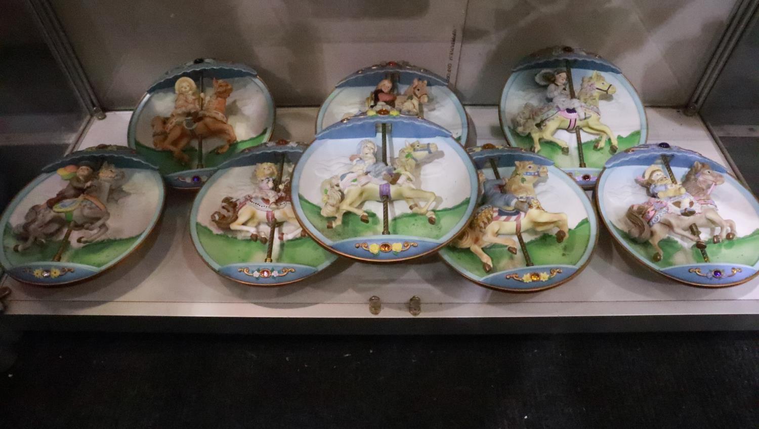 Bradford Exchange ceramic clockwork musical carousel plates, D: 23 cm, (8). UK P&P Group 3 (£30+