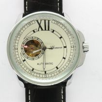GENOA: gents automatic wristwatch with skeleton movement on a black leather strap, working at