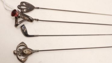 Four hallmarked silver topped hatpins, largest L: 30 cm. UK P&P Group 2 (£20+VAT for the first lot
