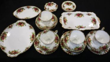 Royal Albert tea ware of twenty two pieces in the Old Country Roses pattern, hairline crack to one