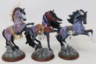 Three Hawthorne Village painted horses from the Laurie Prindle collection, largest H: 18 cm. UK P&