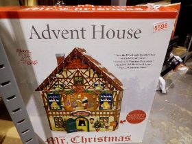 Mr Christmas twenty five song Advent house. Not available for in-house P&P