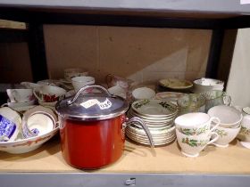 Shelf of mixed ceramics including teacups. Not available for in-house P&P