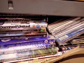 Box of mixed DVDs and CDs. Not available for in-house P&P