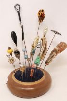 Twenty eight hatpins and a hatpin holder. UK P&P Group 2 (£20+VAT for the first lot and £4+VAT for