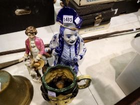 Two Toby jugs and a figurine. Not available for in-house P&P