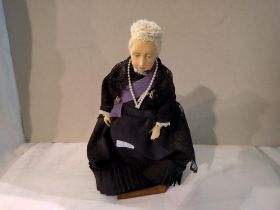 Queen Victoria doll on stand, H: 26 cm. Not available for in-house P&P