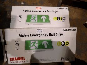 Two LED emergency exit signs. Not available for in-house P&P