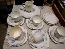 Early 20th Century tea service of 19 pieces by Victoria China, hand painted and gilt. Not