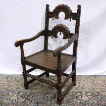 Carved oak armchair with Bobbin stretcher in the Jacobean style. Not available for in-house P&P