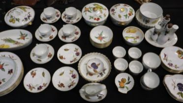 Sixty one pieces of Royal Worcester tea and dinnerware in the Evesham pattern, signs of use but good