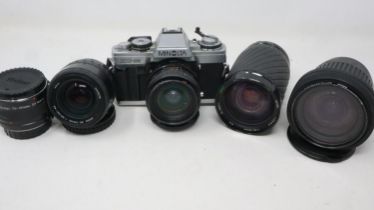 Minolta XGM camera and lenses. Not available for in-house P&P