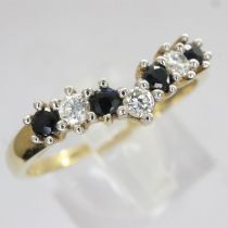 9ct gold wishbone ring set with sapphires and cubic zirconia, size P, 1.5g. UK P&P Group 0 (£6+VAT