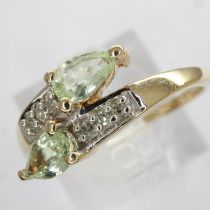 9ct gold ring set with peridot and diamonds, size M, 1.9g. UK P&P Group 0 (£6+VAT for the first