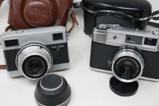 Two 35mm film cameras, a Werra Mat and a Yashica J Rangefinder. UK P&P Group 2 (£20+VAT for the