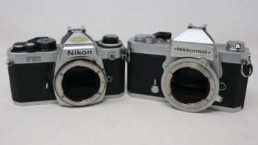 Nikon FE2 and a Nikon Nikkormat camera bodies. UK P&P Group 2 (£20+VAT for the first lot and £4+