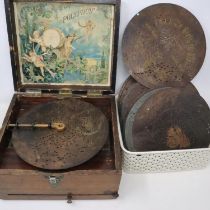 Victorian walnut cased polyphon in working order with 39 disks, discs D: 21 cm, some missing teeth