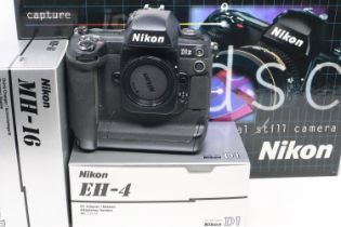 Nikon D1X camera kit complete with chargers, working. Not available for in-house P&P