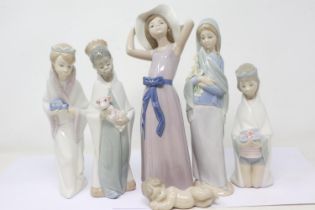 Three Lladro kings and three other Lladro figurines, losses to Lillies on one, largest H: 24 cm.