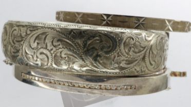 Three silver bangles including two hallmarked silver examples, largest D: 70 mm. UK P&P Group 1 (£