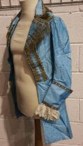 Early 20th century theatrical turquoise jacket, fringed with adornments, approximate size S. UK P&