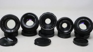Five 35mm prime lenses including Ricoh & Meyer-Optik. P&P Group 1 (£14+VAT for the first lot and £