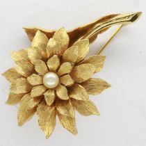 Yellow metal pin brooch, stamped 1144, set with a single pearl, H: 50 mm, 14.2g. UK P&P Group 0 (£