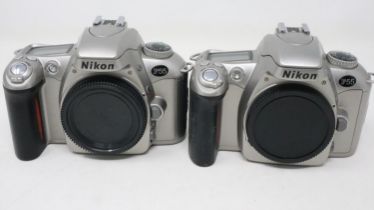 Two Nikon F55 SLR camera bodies. UK P&P Group 2 (£20+VAT for the first lot and £4+VAT for subsequent