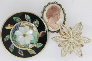 Three silver brooches including a cameo example, largest D: 40 mm. UK P&P Group 1 (£16+VAT for the