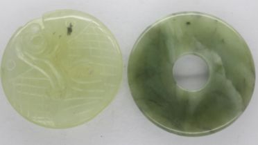 Two circular pieces of Jade, largest D: 50 mm. UK P&P Group 1 (£16+VAT for the first lot and £2+